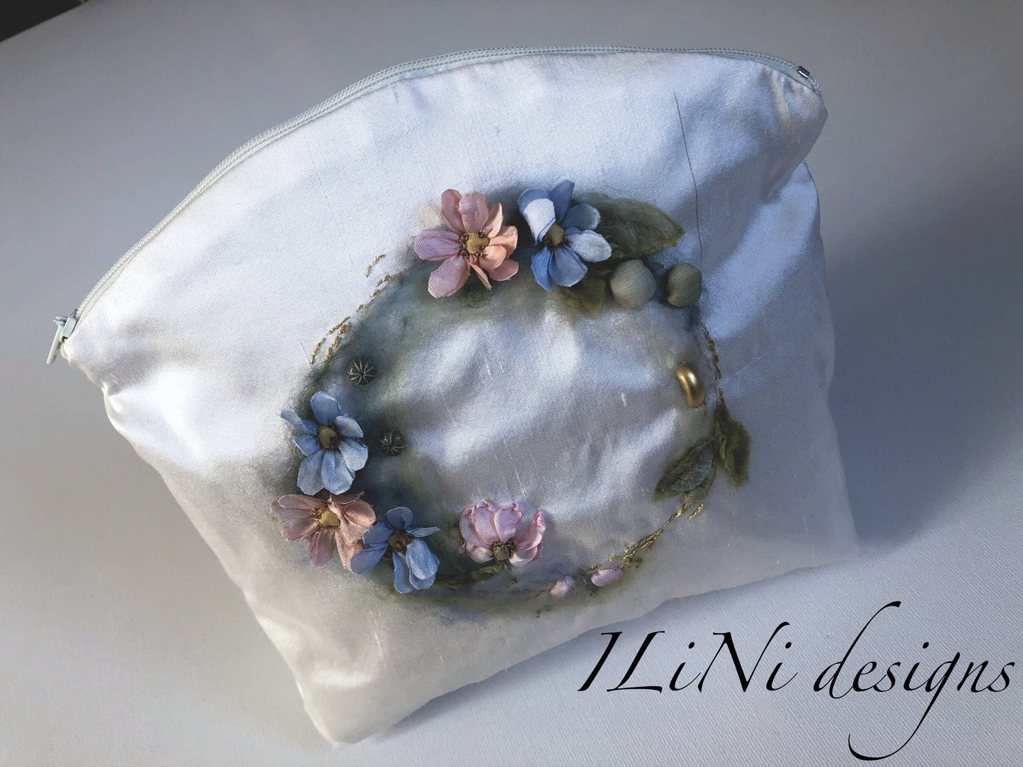 Handmade silk makeup bag with ring of daisies - hand embroidery detail with silk ribbon embroidery
